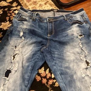 Blue jean with ripped areas but your skin is not showing good condition